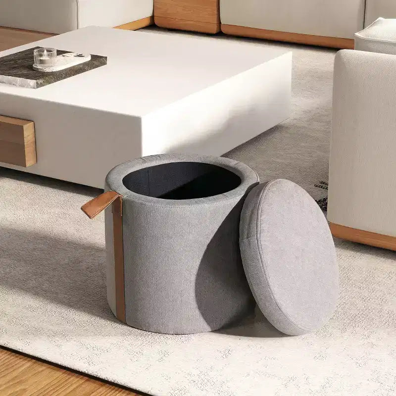 Pouf de rangement rond rembourré avec accent en cuir